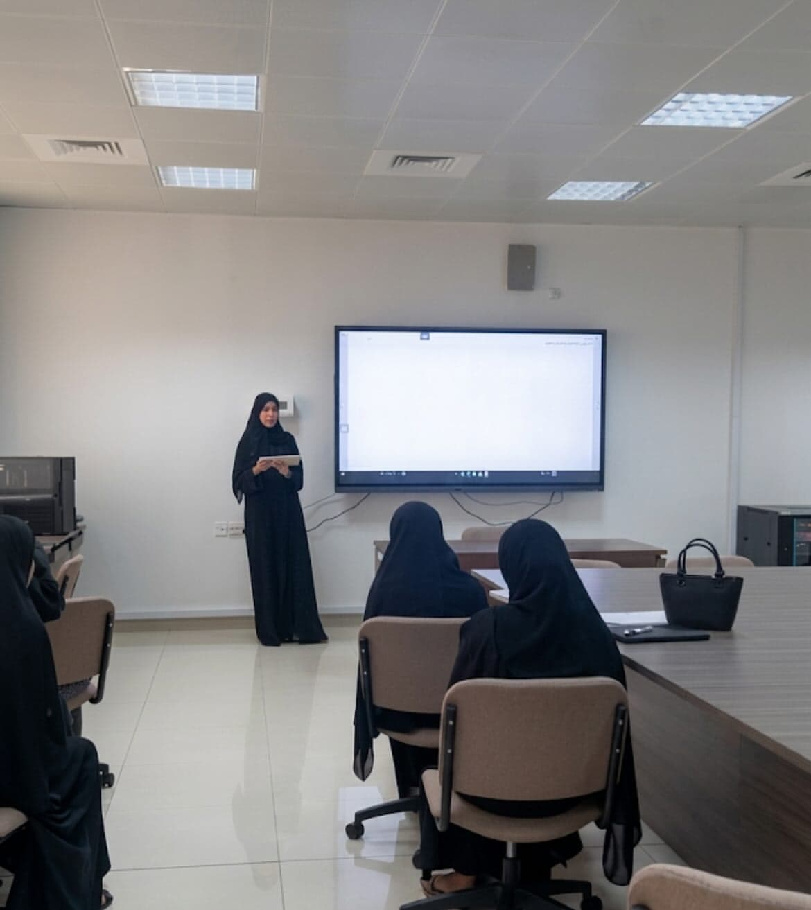 A participant presenting a solution to the classroom